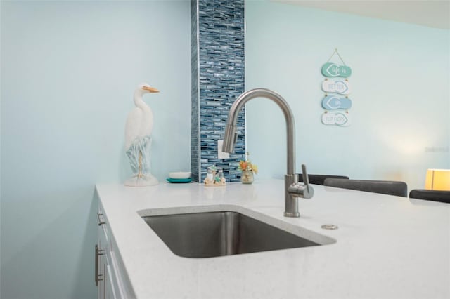 337 Rex Pl Unit G, Madeira Beach, FL 33708 - details with a sink and white cabinetry
