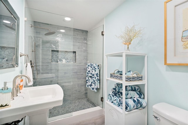 337 Rex Pl Unit G, Madeira Beach, FL 33708 - full bath featuring a stall shower, toilet, a sink, and recessed lighting