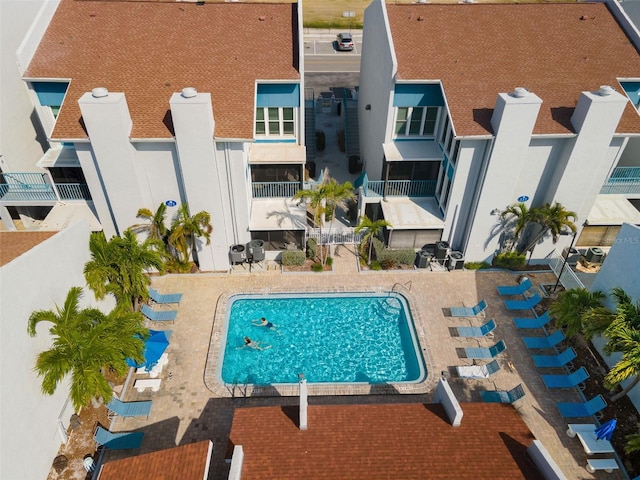 337 Rex Pl Unit G, Madeira Beach, FL 33708 - community pool with a patio