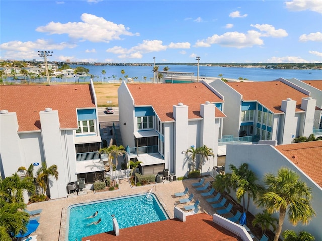 337 Rex Pl Unit G, Madeira Beach, FL 33708 - pool featuring a water view and a patio area