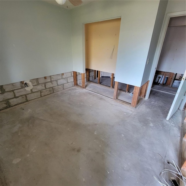 1234 11th Cir SE, Largo, FL 33771 - empty room featuring concrete flooring