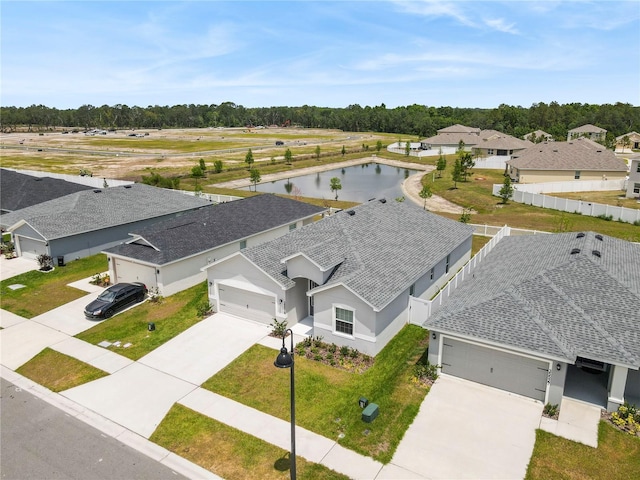 view from above of property with a large body of water