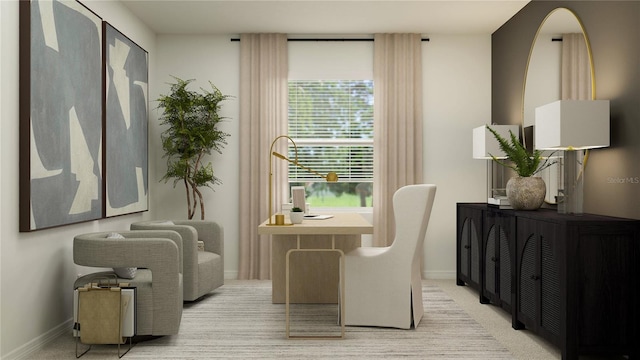 living area with baseboards and light carpet