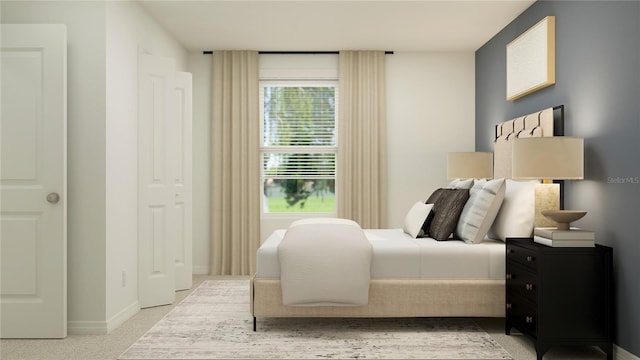 bedroom featuring baseboards and light carpet