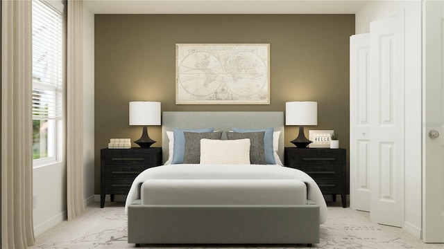 bedroom with carpet flooring and baseboards
