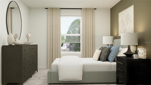 bedroom featuring baseboards