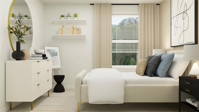 bedroom with baseboards and carpet flooring