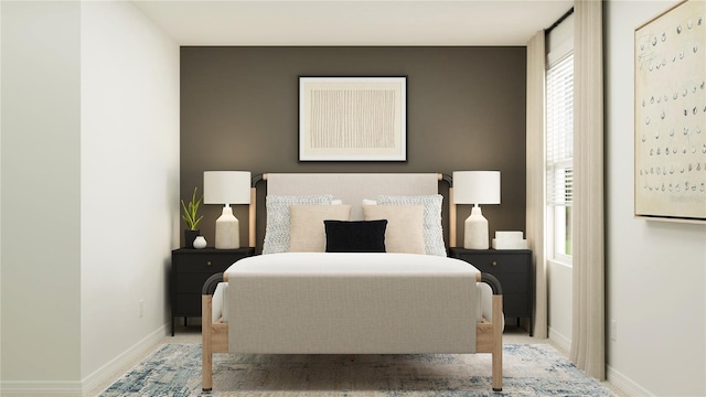 bedroom featuring baseboards