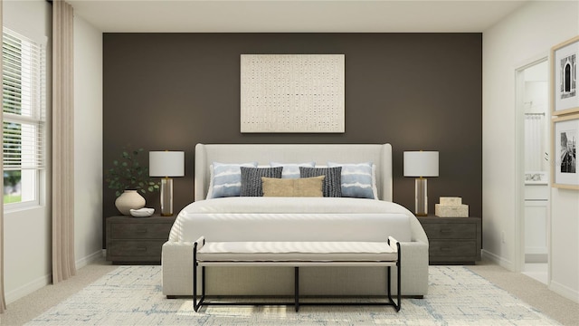 bedroom with carpet floors and baseboards