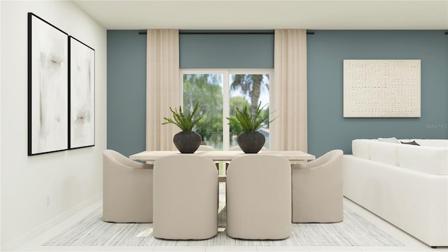 dining space with baseboards