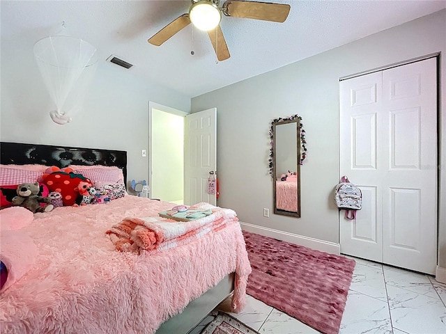 bedroom featuring baseboards, marble finish floor, ceiling fan, and visible vents