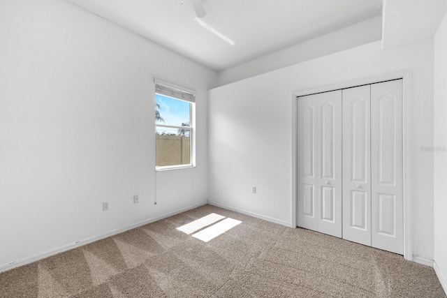 2808 Abbey Grove Dr, Valrico, FL 33594 - unfurnished bedroom featuring carpet flooring, a closet, and a ceiling fan