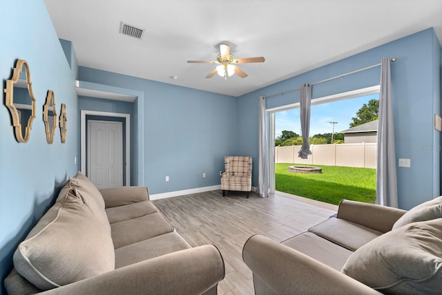 2808 Abbey Grove Dr, Valrico, FL 33594 - living room with wood finished floors and ceiling fan