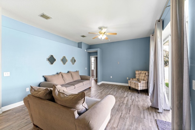 2808 Abbey Grove Dr, Valrico, FL 33594 - living room featuring wood finished floors and a ceiling fan
