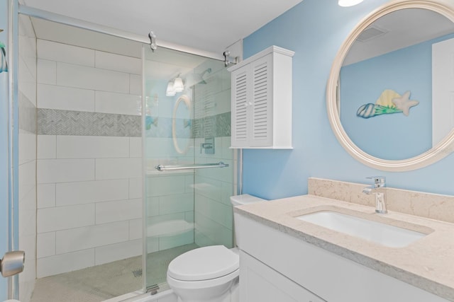 18650 Gulf Blvd Unit 203, Indian Shores, FL 33785 - bathroom featuring a stall shower, toilet, and vanity