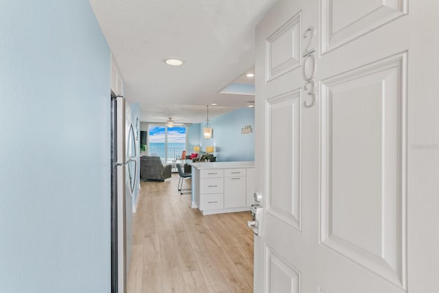 18650 Gulf Blvd Unit 203, Indian Shores, FL 33785 - hallway featuring light wood-style flooring