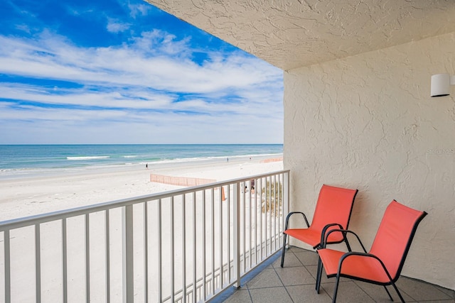 18650 Gulf Blvd Unit 203, Indian Shores, FL 33785 - balcony featuring view of water and beach