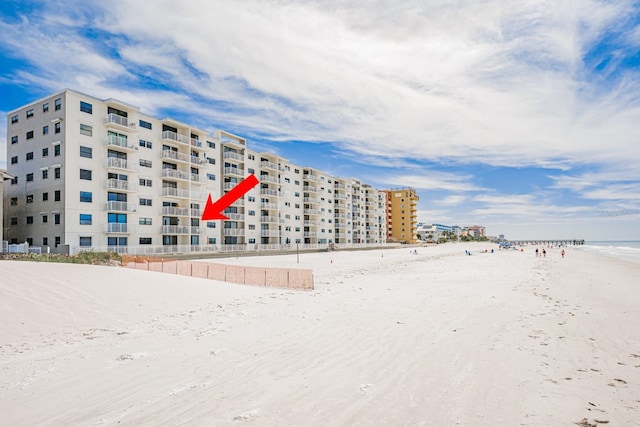 18650 Gulf Blvd Unit 203, Indian Shores, FL 33785 - view of apartment building / complex featuring view of water and beach