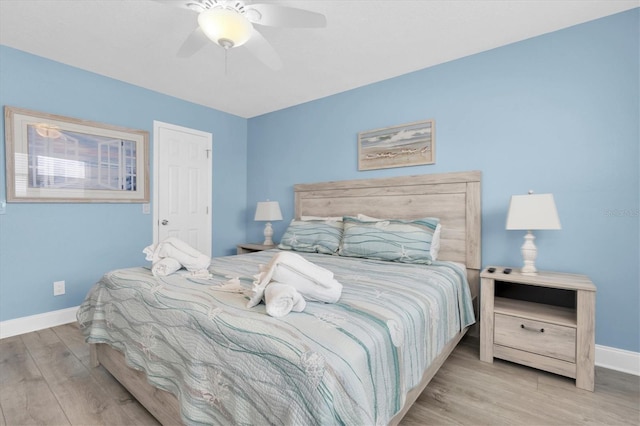 18650 Gulf Blvd Unit 203, Indian Shores, FL 33785 - bedroom featuring wood finished floors and a ceiling fan
