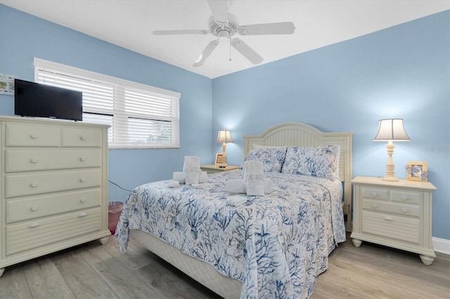 18650 Gulf Blvd Unit 203, Indian Shores, FL 33785 - bedroom with light wood-type flooring and a ceiling fan
