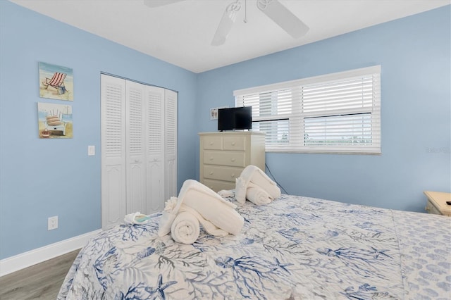 18650 Gulf Blvd Unit 203, Indian Shores, FL 33785 - bedroom with wood finished floors, a closet, and ceiling fan