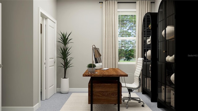 office featuring carpet and baseboards