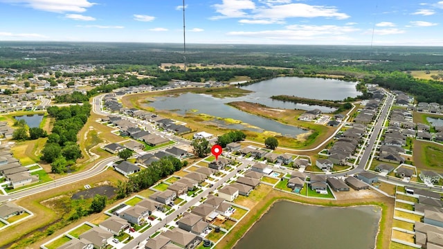 aerial view with a water view and a residential view