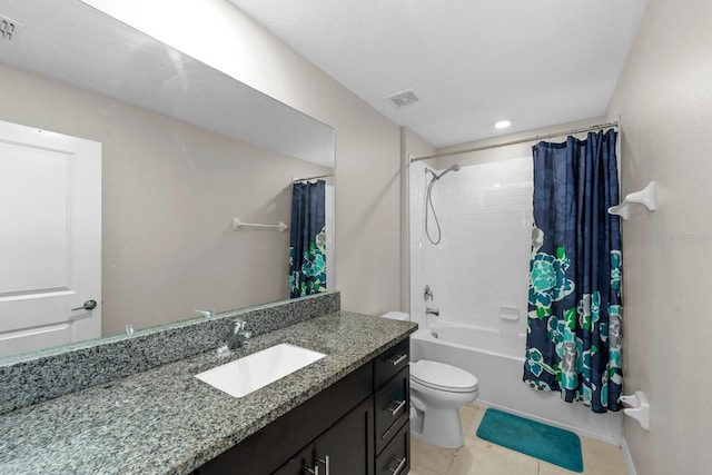 full bathroom with toilet, shower / bath combo with shower curtain, vanity, visible vents, and tile patterned flooring