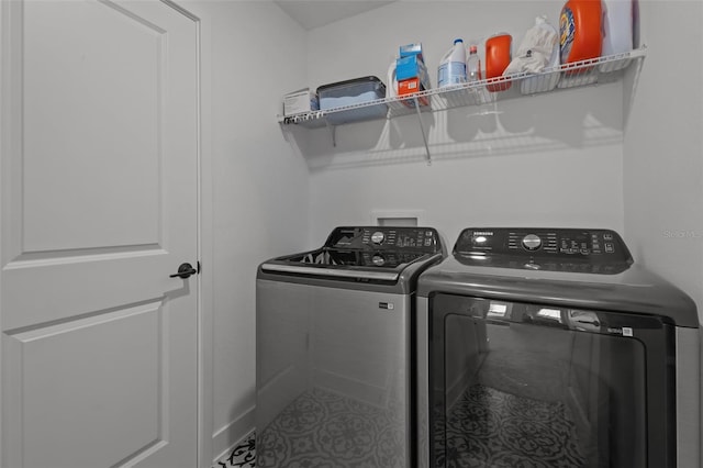 laundry area featuring laundry area and independent washer and dryer