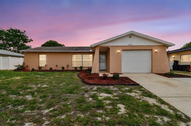 8531 Woodcrest Dr, Port Richey, FL 34668 - ranch-style home with concrete driveway, stucco siding, and a garage