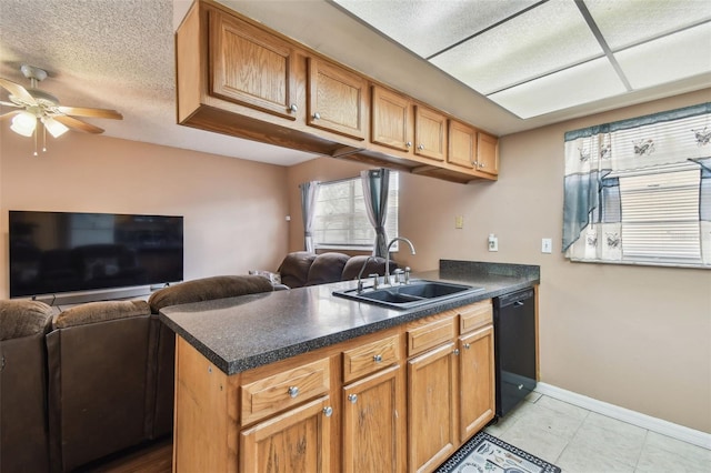 8531 Woodcrest Dr, Port Richey, FL 34668 - kitchen with dishwasher, open floor plan, a sink, a ceiling fan, and dark countertops