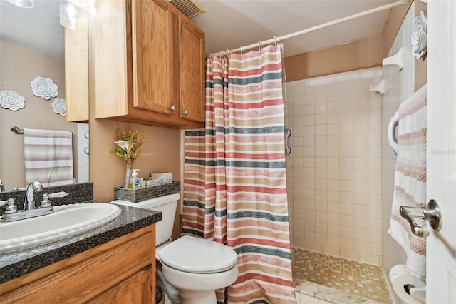 8531 Woodcrest Dr, Port Richey, FL 34668 - full bath featuring toilet, a tile shower, and vanity