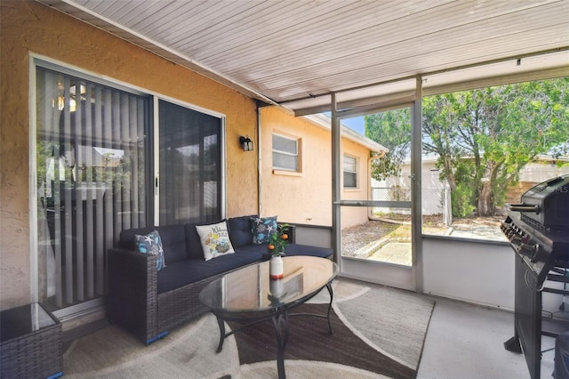 8531 Woodcrest Dr, Port Richey, FL 34668 - sunroom featuring an outdoor living space