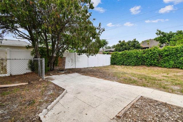 8531 Woodcrest Dr, Port Richey, FL 34668 - view of yard with fence and a patio