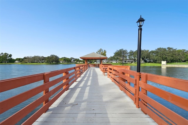 8531 Woodcrest Dr, Port Richey, FL 34668 - dock area featuring a gazebo and a water view