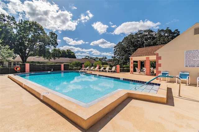 8531 Woodcrest Dr, Port Richey, FL 34668 - community pool with a patio area and fence