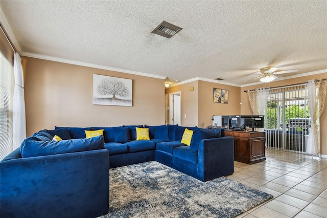 8531 Woodcrest Dr, Port Richey, FL 34668 - living area featuring light tile patterned floors, ceiling fan, crown molding, and a textured ceiling