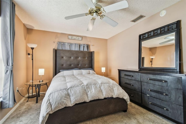 8531 Woodcrest Dr, Port Richey, FL 34668 - bedroom with carpet, a textured ceiling, a ceiling fan, and baseboards