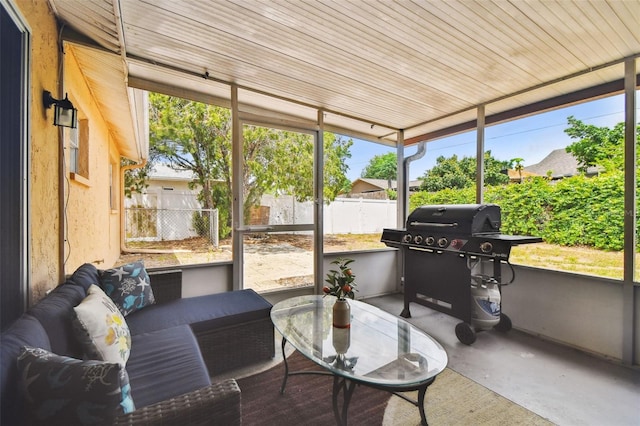 8531 Woodcrest Dr, Port Richey, FL 34668 - sunroom / solarium with an outdoor hangout area