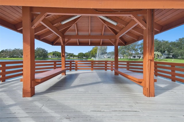 8531 Woodcrest Dr, Port Richey, FL 34668 - wooden terrace with a gazebo and a water view
