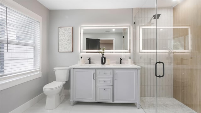 1715 N Alexander Rd, Tampa, FL 33603 - bathroom with double vanity, toilet, baseboards, a shower stall, and a sink