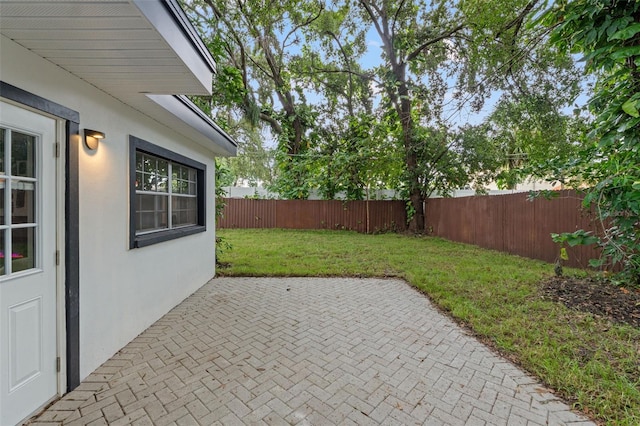 1715 N Alexander Rd, Tampa, FL 33603 - view of patio with a fenced backyard