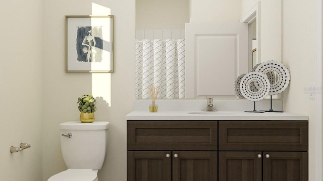 bathroom with toilet and vanity