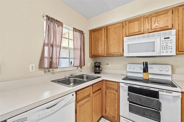 732 Kensington Lake Cir, Brandon, FL 33511 - kitchen featuring white appliances, a sink, and light countertops
