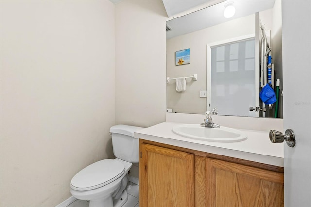 732 Kensington Lake Cir, Brandon, FL 33511 - half bathroom featuring baseboards, toilet, vanity, and tile patterned flooring