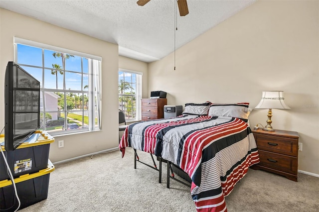 732 Kensington Lake Cir, Brandon, FL 33511 - carpeted bedroom with baseboards, a textured ceiling, vaulted ceiling, and a ceiling fan