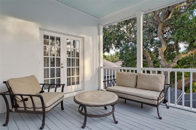 sunroom featuring french doors