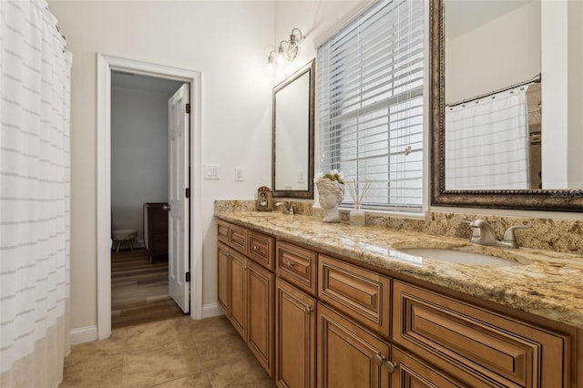 full bathroom featuring double vanity and tile patterned floors