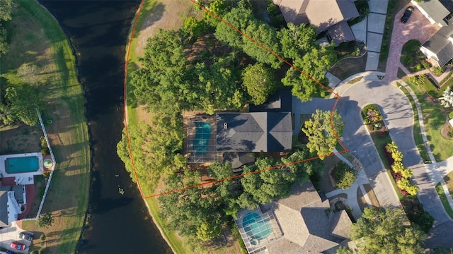 aerial view of property and surrounding area with property parcel outlined