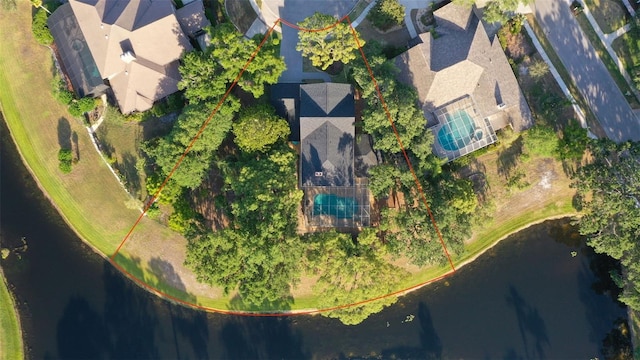 aerial overview of property's location featuring property boundaries highlighted and a nearby body of water